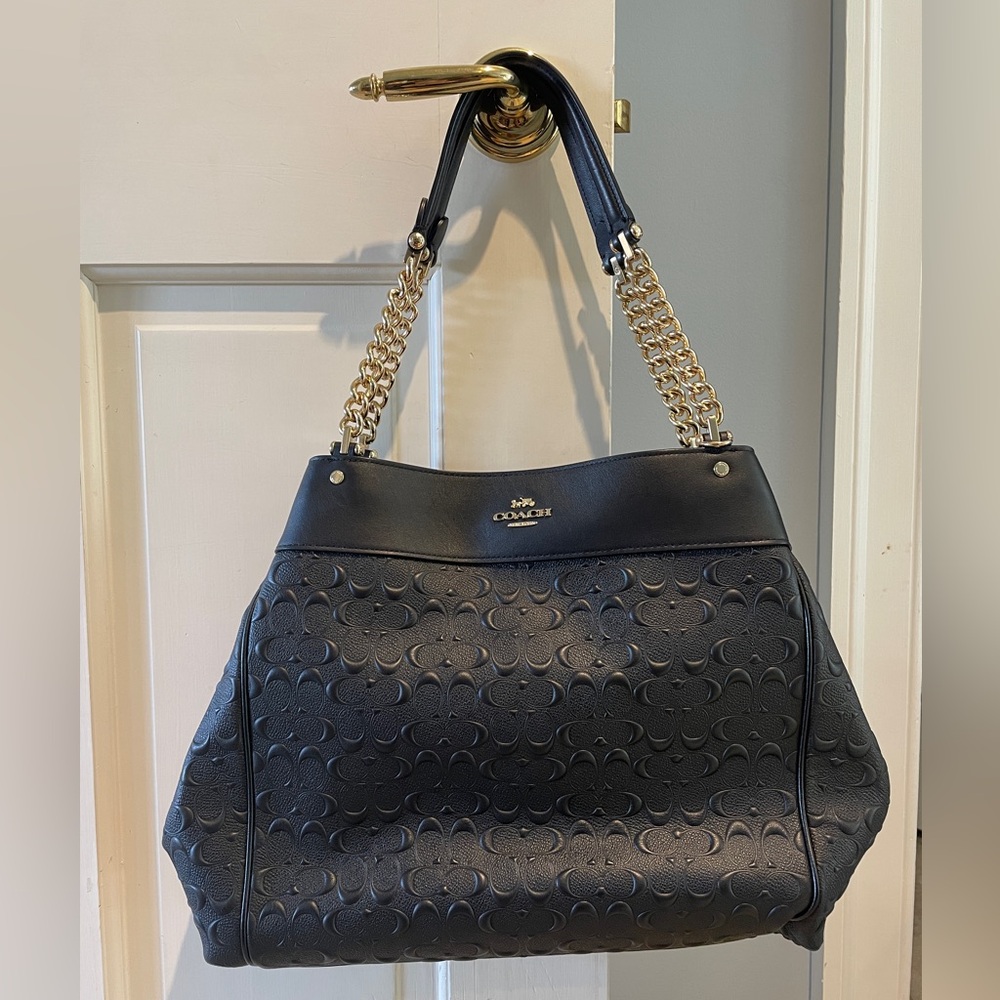 Coach Embossed Monogram shoulder bag.